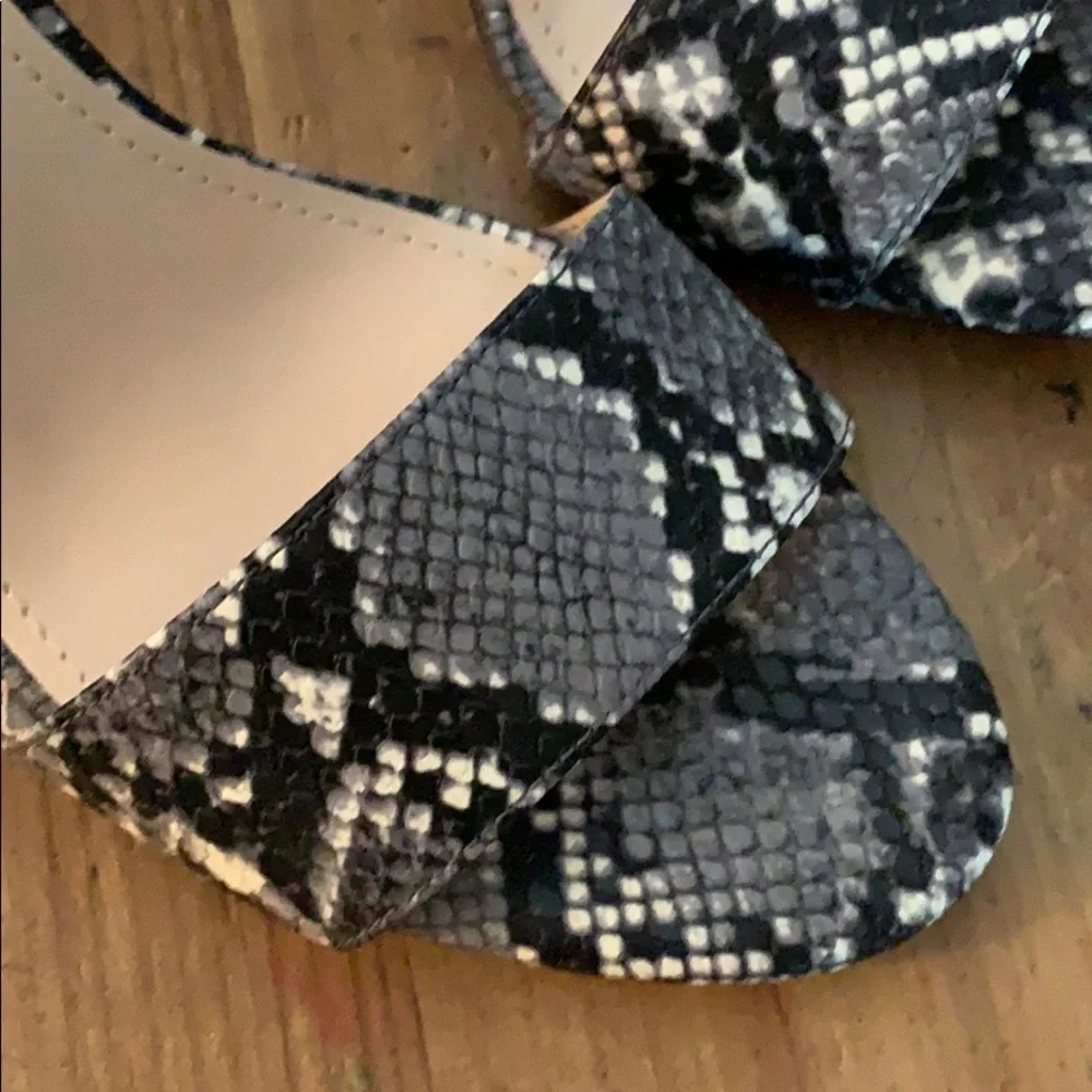 Brand new never worn snakeskin heels